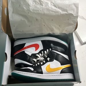 Air Jordan 1! Barely worn with super cute red green and yellow details!
